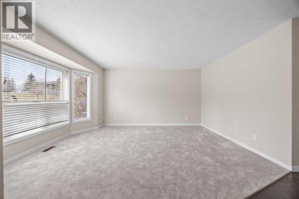 119 Bedfield Close Ne, Calgary, Alberta  T3K 3L6 - Photo 5 - A2303438