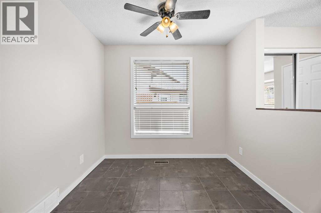 119 Bedfield Close Ne, Calgary, Alberta  T3K 3L6 - Photo 11 - A2303438