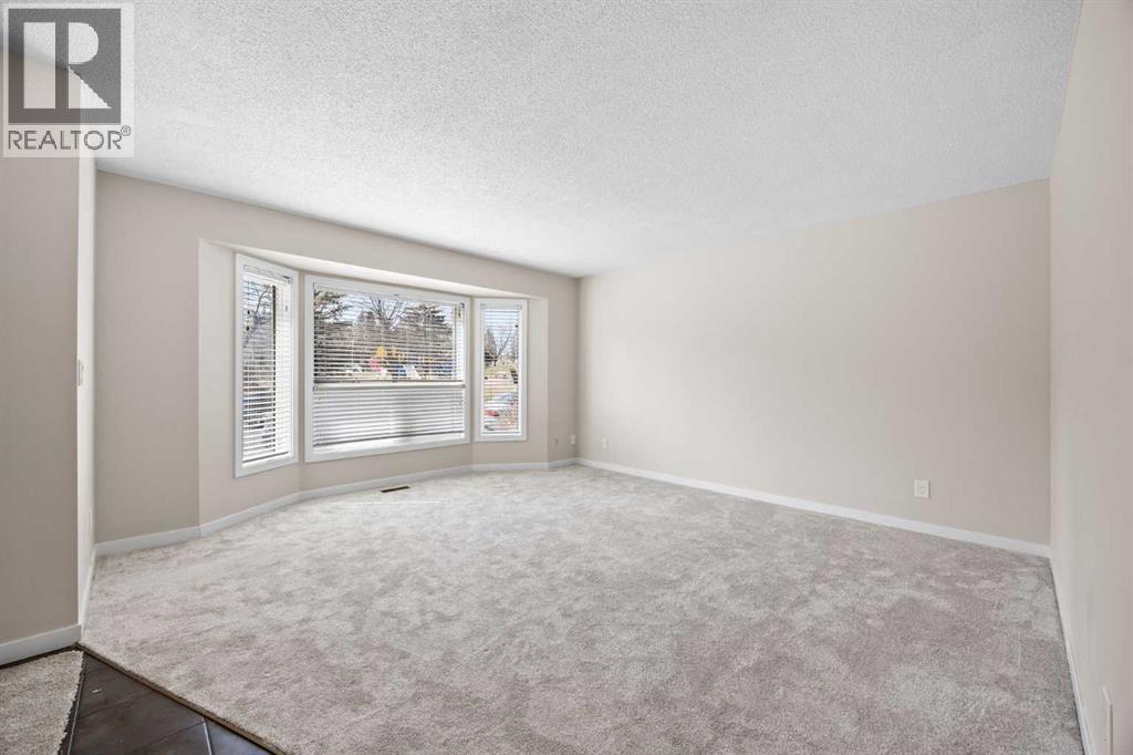 119 Bedfield Close Ne, Calgary, Alberta  T3K 3L6 - Photo 6 - A2303438