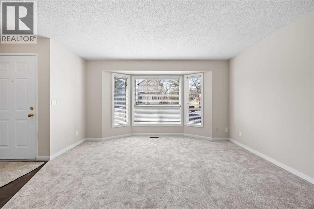 119 Bedfield Close Ne, Calgary, Alberta  T3K 3L6 - Photo 7 - A2303438