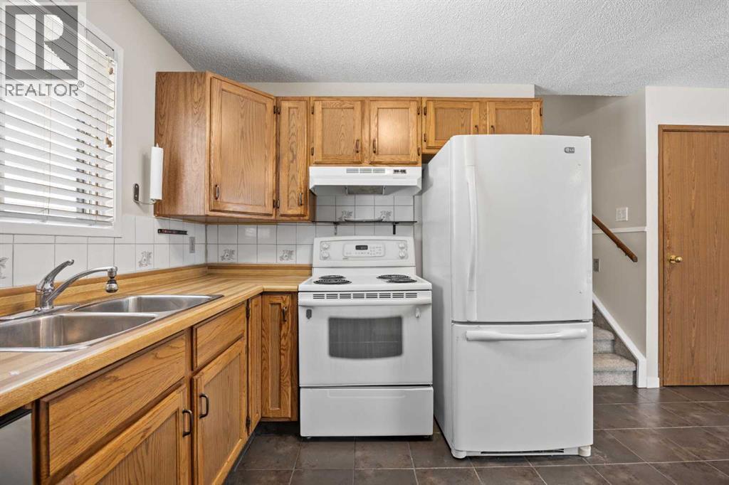 119 Bedfield Close Ne, Calgary, Alberta  T3K 3L6 - Photo 15 - A2303438