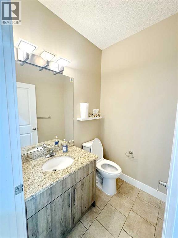 109 Kinniburgh Boulevard E, Chestermere, Alberta  T1X 0L9 - Photo 19 - A2304356