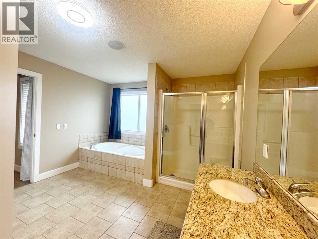 109 Kinniburgh Boulevard E, Chestermere, Alberta  T1X 0L9 - Photo 7 - A2304356