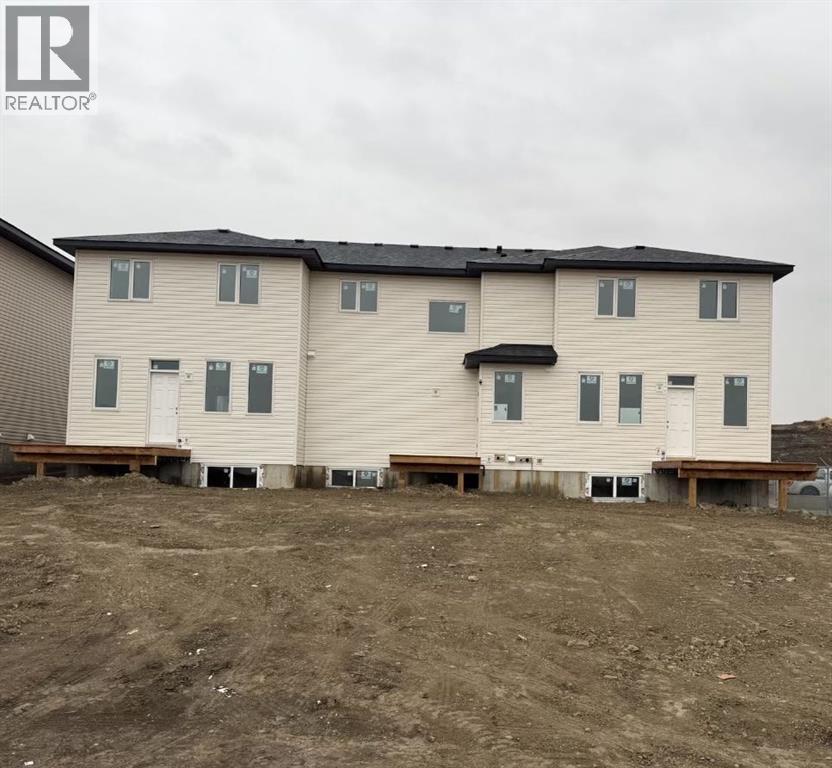 1995 Mccaskill Drive, Crossfield, Alberta  T0M 0C1 - Photo 4 - A2304983