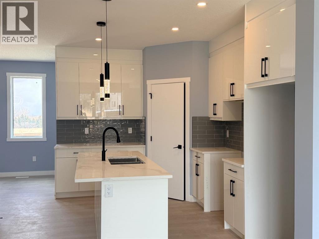 1995 Mccaskill Drive, Crossfield, Alberta  T0M 0C1 - Photo 7 - A2304983