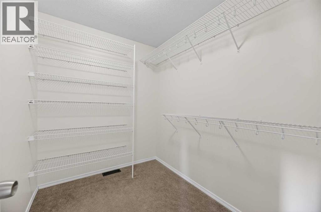 211 200 Carriage Lane Place, Carstairs, Alberta  T0M 0N0 - Photo 17 - A2303309