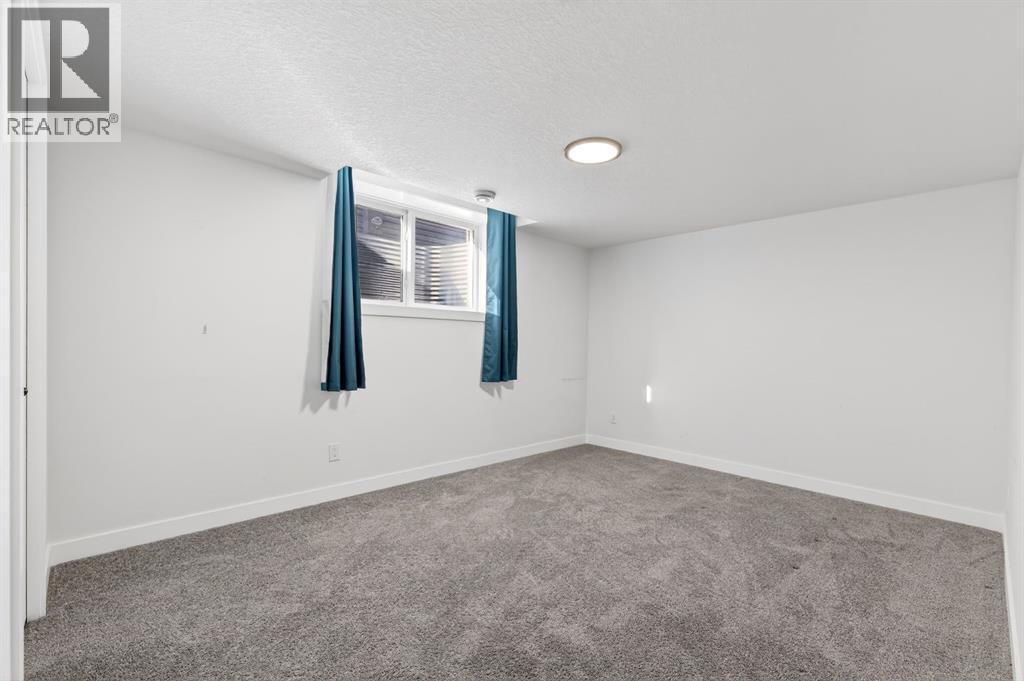 208 Dawson Circle, Chestermere, Alberta  T1X 2R2 - Photo 47 - A2304859