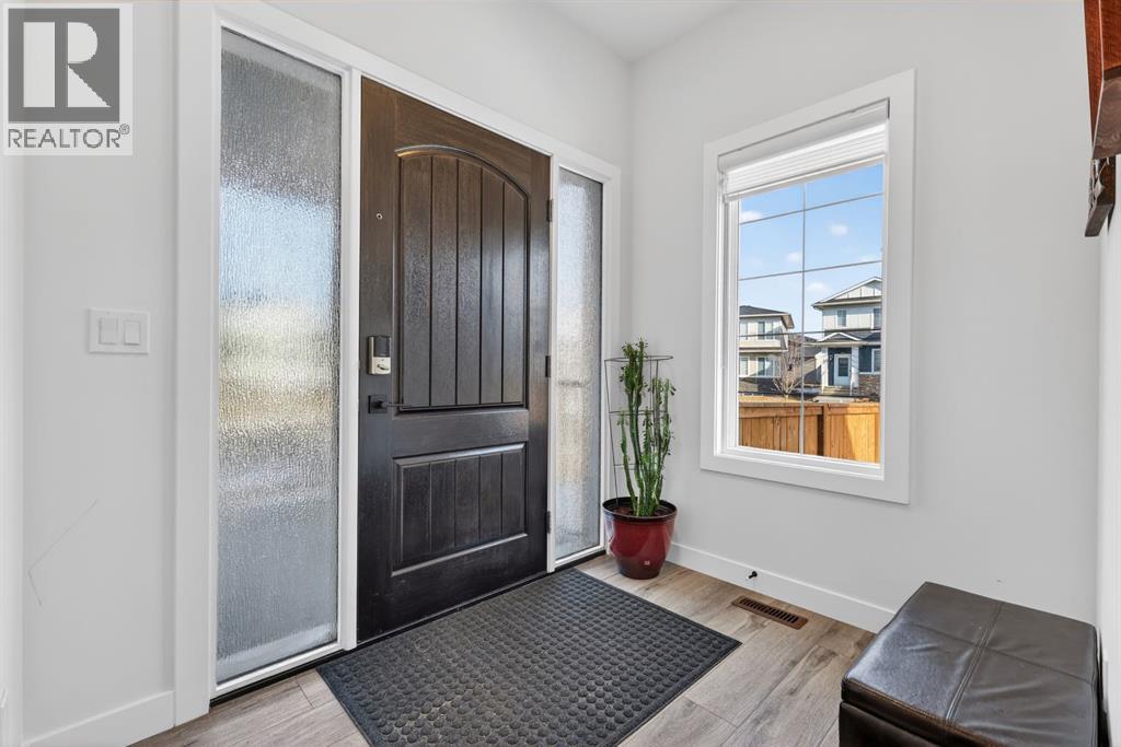 208 Dawson Circle, Chestermere, Alberta  T1X 2R2 - Photo 3 - A2304859