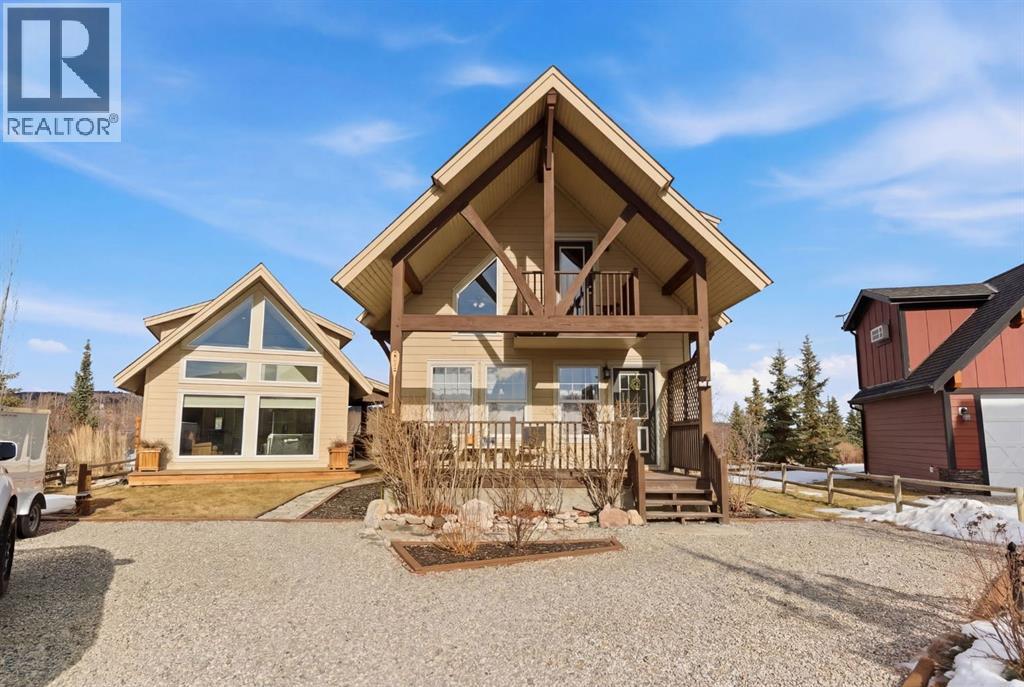 212 Cottageclub Crescent, Rural Rocky View County, Alberta  T2K 1B3 - Photo 1 - A2291790