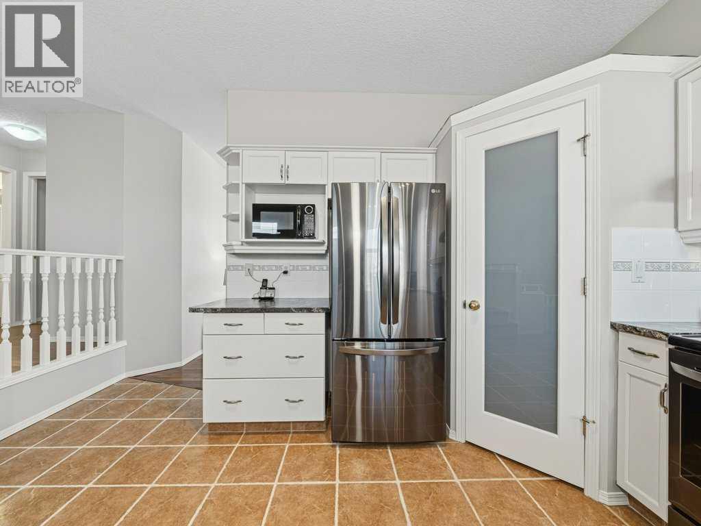 106 Springs Place Se, Airdrie, Alberta  T4A 2C9 - Photo 5 - A2285132