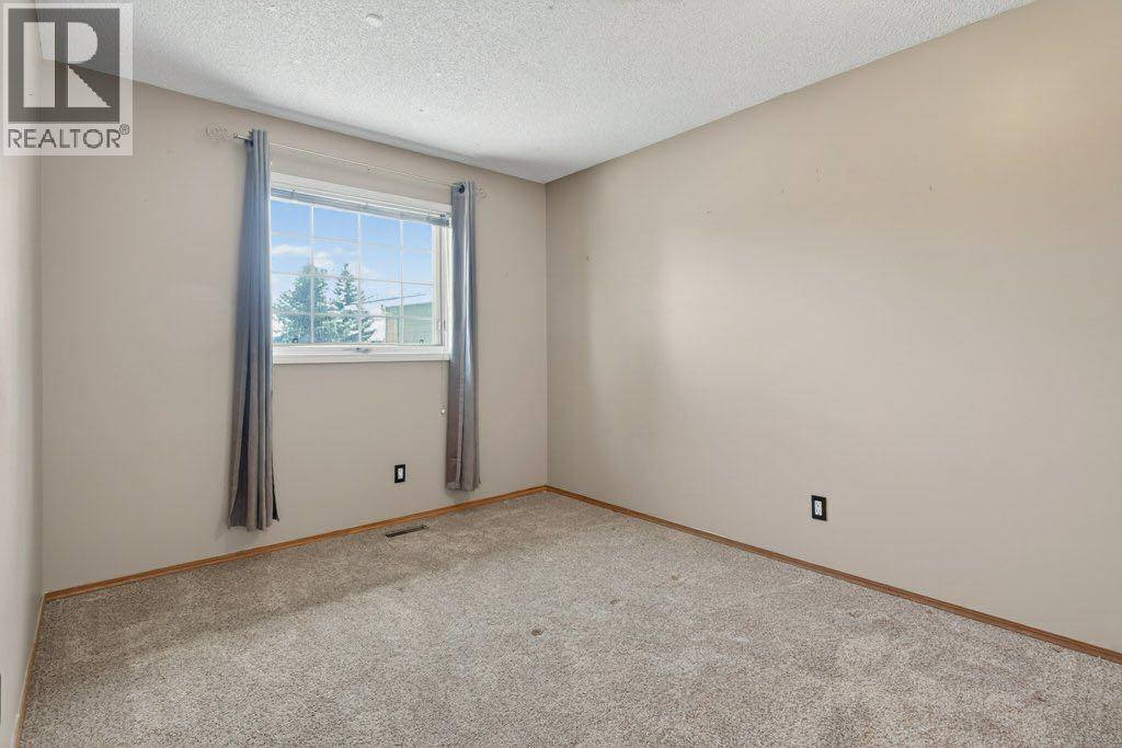 29 Shannon Manor Sw, Calgary, Alberta  T2Y 2Y5 - Photo 18 - A2303275