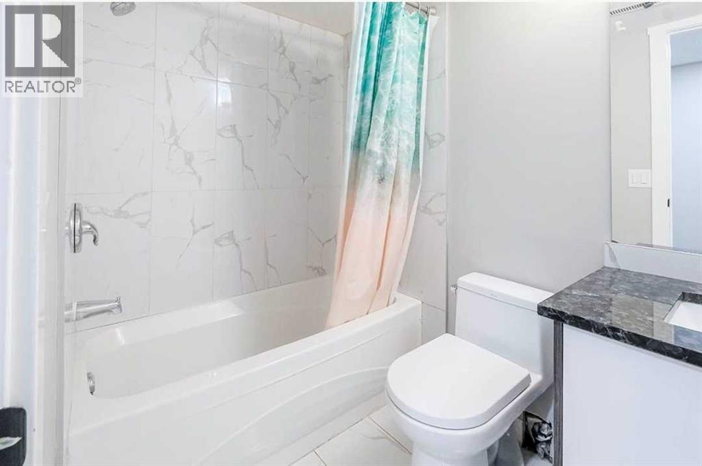 6923 Laguna Way NE, Calgary, Alberta  T1Y 6W2 - Photo 10 - A2304304