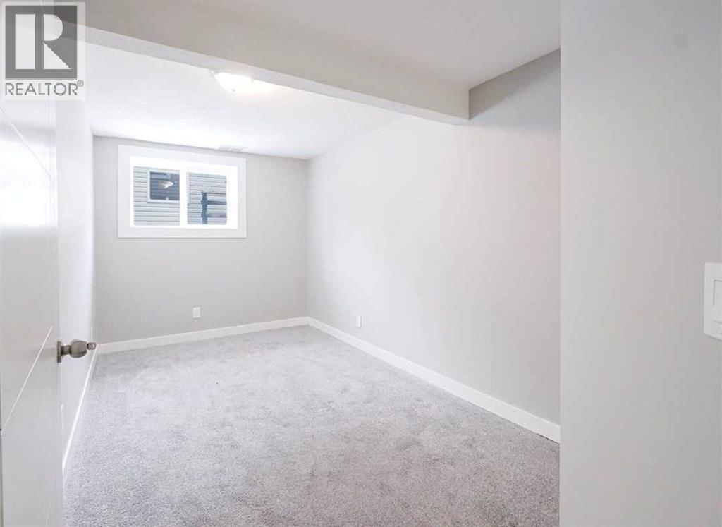 6923 Laguna Way NE, Calgary, Alberta  T1Y 6W2 - Photo 11 - A2304304