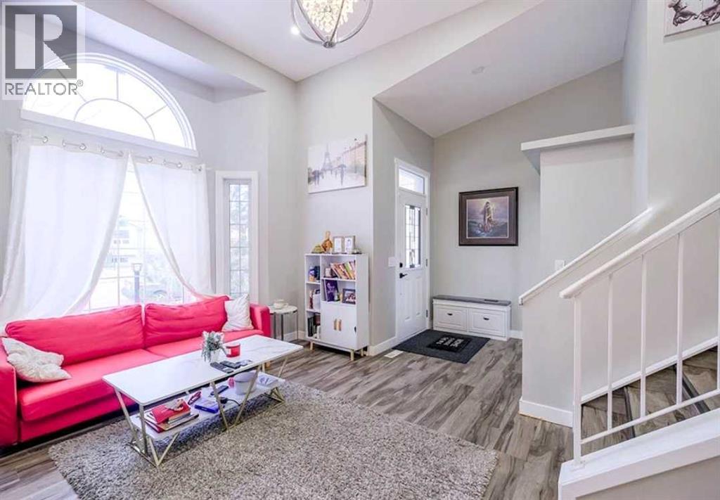 6923 Laguna Way NE, Calgary, Alberta  T1Y 6W2 - Photo 3 - A2304304