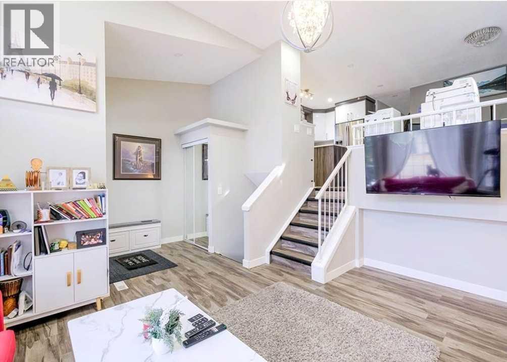 6923 Laguna Way NE, Calgary, Alberta  T1Y 6W2 - Photo 5 - A2304304