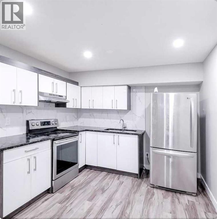 6923 Laguna Way NE, Calgary, Alberta  T1Y 6W2 - Photo 21 - A2304304