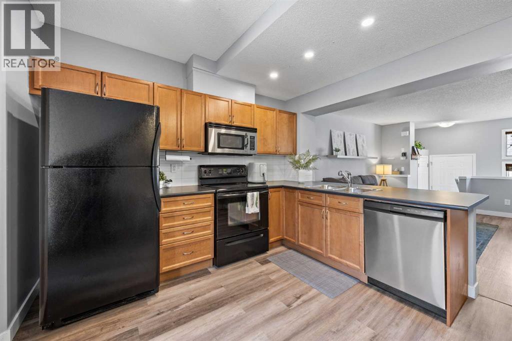 3065 New Brighton Gardens Se, Calgary, Alberta  T2Z 0A4 - Photo 12 - A2304080