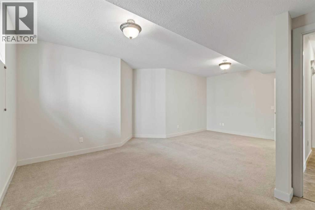 351 Crystal Green Rise, Okotoks, Alberta  T1S 2N6 - Photo 38 - A2304445