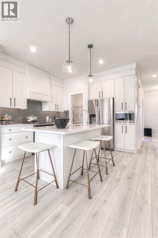 34 Bridgeport Circle, Chestermere, Alberta  T1X 3C9 - Photo 3 - A2305439