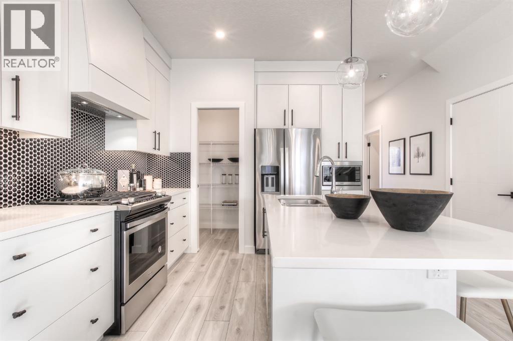 34 Bridgeport Circle, Chestermere, Alberta  T1X 3C9 - Photo 6 - A2305439