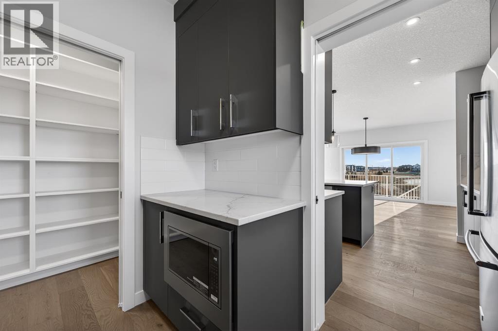 709 Dawson Common, Chestermere, Alberta  T1X 1Z7 - Photo 5 - A2305430