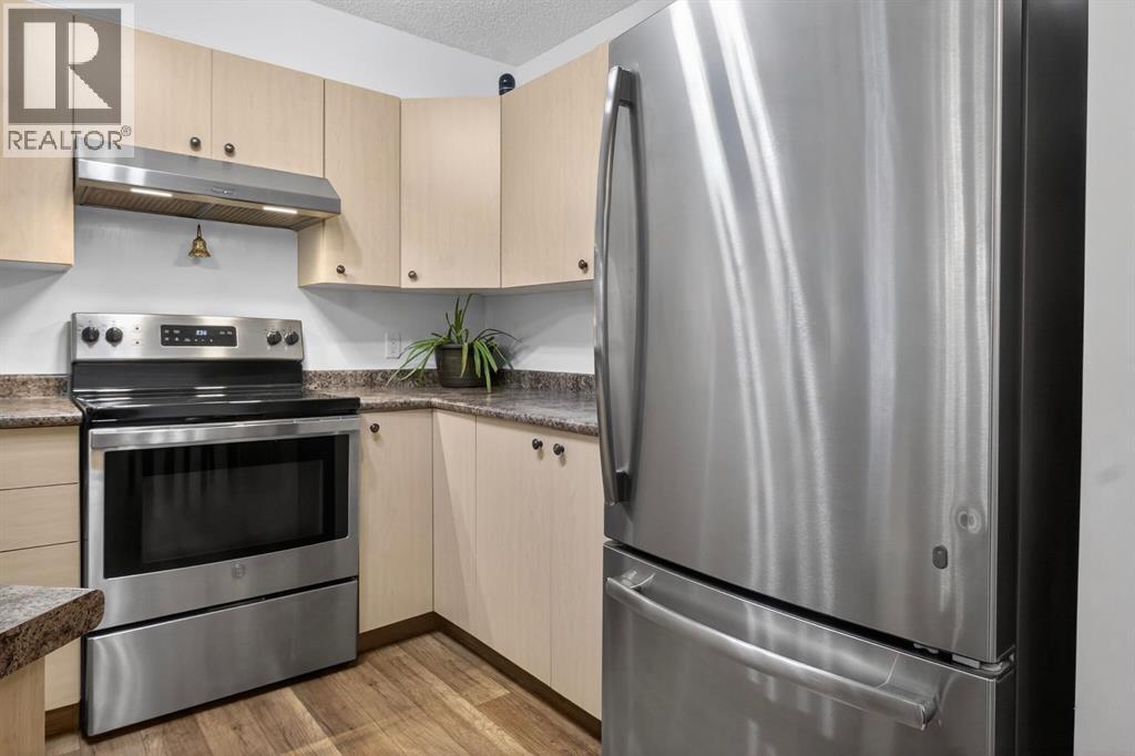 8117, 304 Mackenzie Way Sw, Airdrie, Alberta  T4B 2W4 - Photo 6 - A2291901