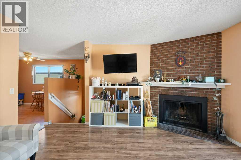 113 Ranch Glen Place Nw, Calgary, Alberta  T3G 1E9 - Photo 7 - A2299007