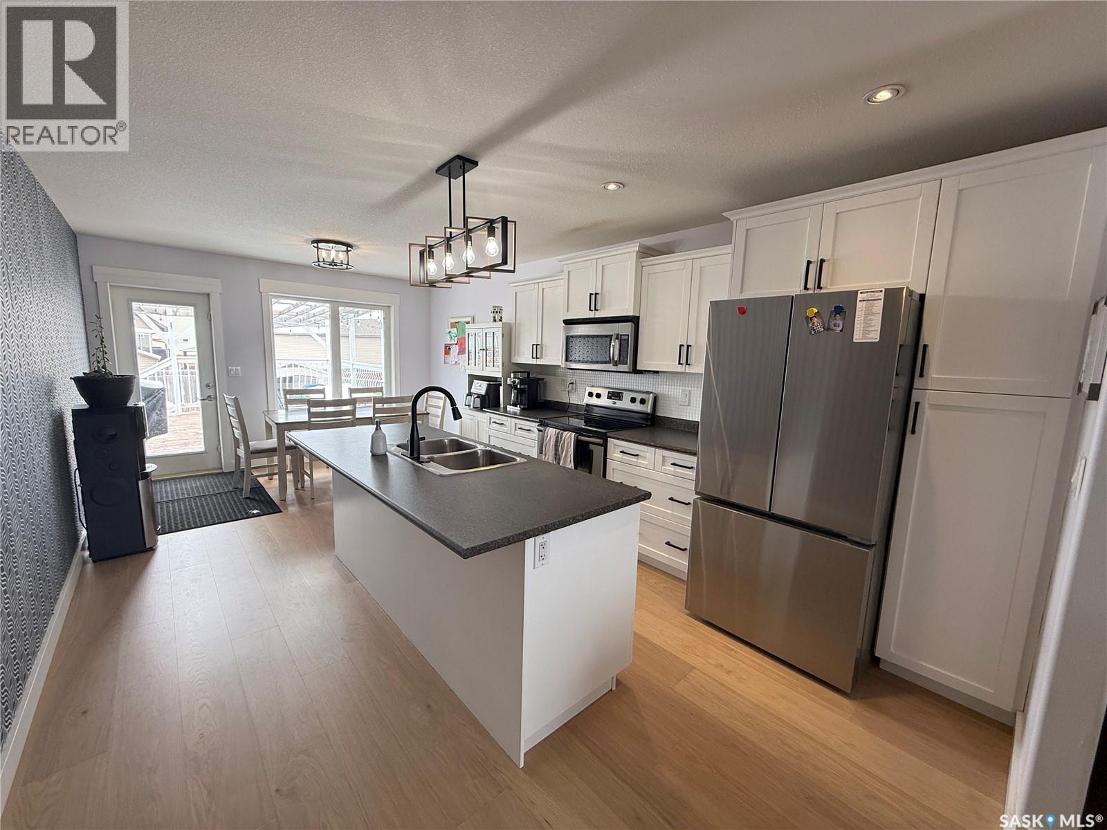 724 Quessy Drive, Martensville, Saskatchewan  S0K 0A2 - Photo 8 - SK033993