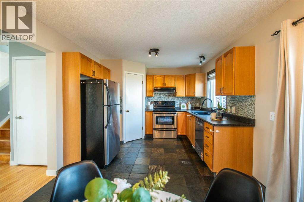 84 Hidden Green NW, Calgary, Alberta  T3A 5K7 - Photo 11 - A2296267