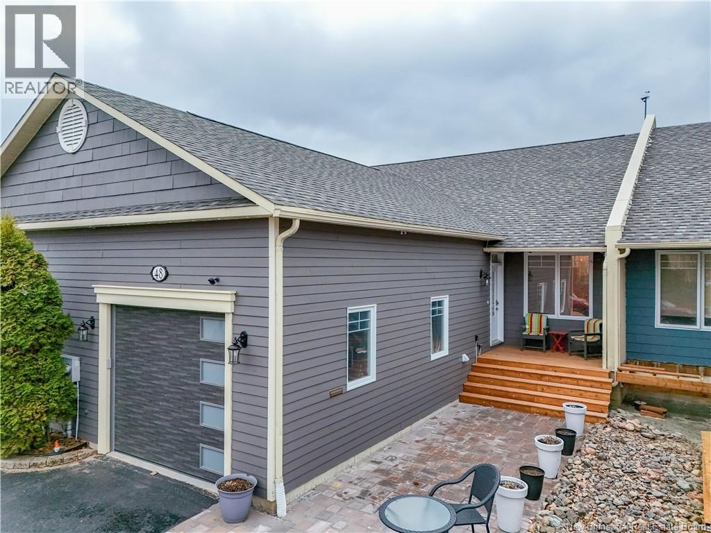 <h3>$750,000</h3><p>48 Waterford Lane, Fredericton, New Brunswick</p>