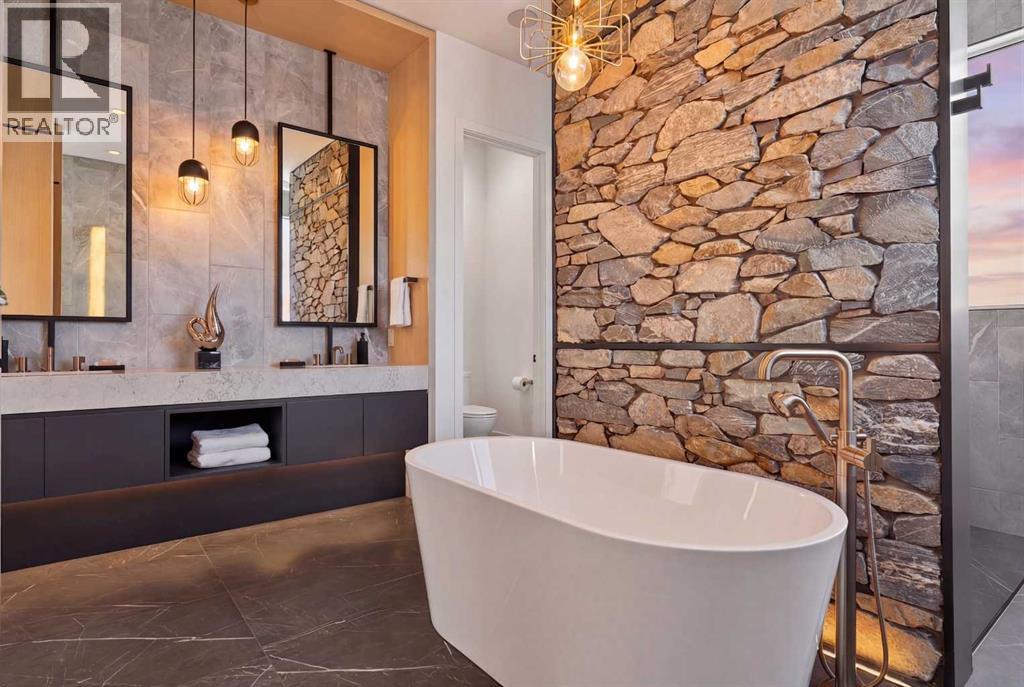 105 Silverhorn Ridge, Rural Rocky View County, Alberta  T3R 0X3 - Photo 7 - A2305428