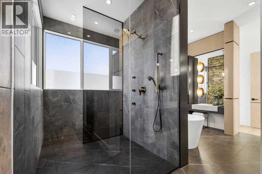 105 Silverhorn Ridge, Rural Rocky View County, Alberta  T3R 0X3 - Photo 28 - A2305428