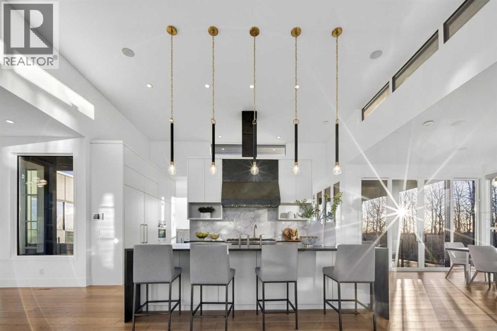 105 Silverhorn Ridge, Rural Rocky View County, Alberta  T3R 0X3 - Photo 3 - A2305428