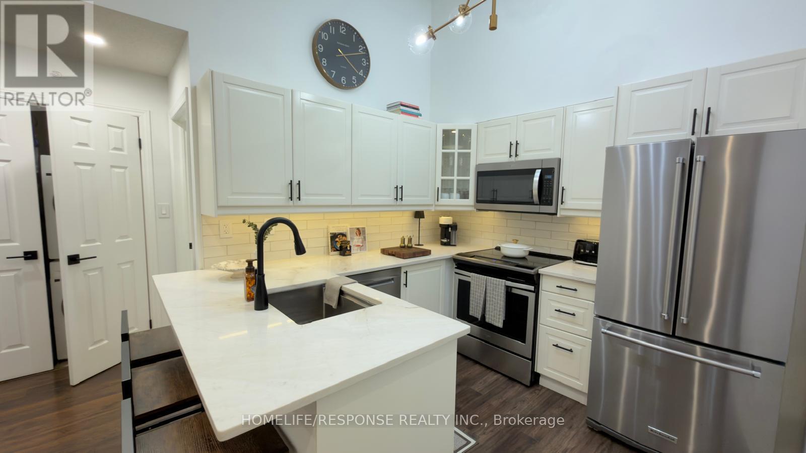 408 - 2075 Appleby Line, Burlington, Ontario  L7L 7H3 - Photo 5 - W12900526