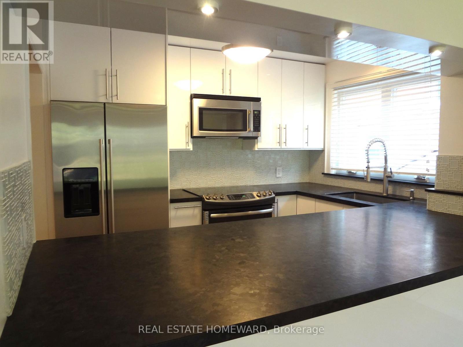 Main Floor - 21 Love Crescent, Toronto, Ontario  M4E 1V6 - Photo 5 - E12825162