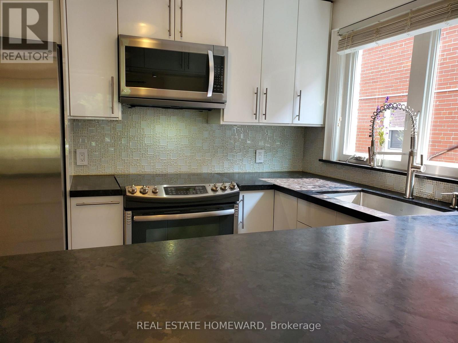 Main Floor - 21 Love Crescent, Toronto, Ontario  M4E 1V6 - Photo 6 - E12825162