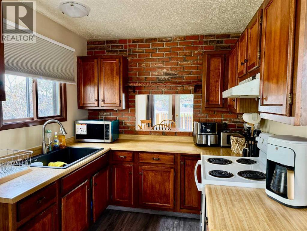 213 Stafford Bay N, Lethbridge, Alberta  T1H 5L2 - Photo 6 - A2305350