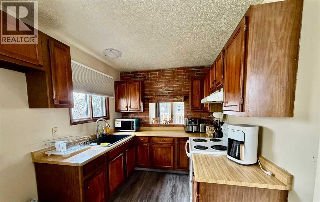 213 Stafford Bay N, Lethbridge, Alberta  T1H 5L2 - Photo 7 - A2305350