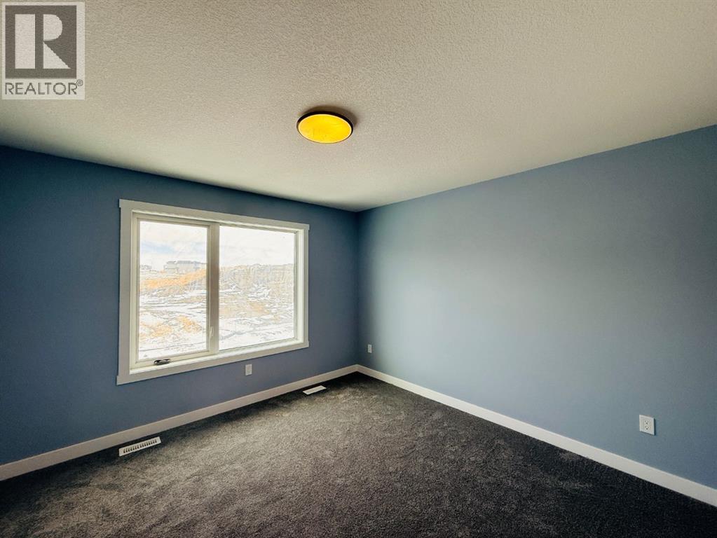 1999 Mccaskill Drive, Crossfield, Alberta  T0M 0C1 - Photo 16 - A2255750