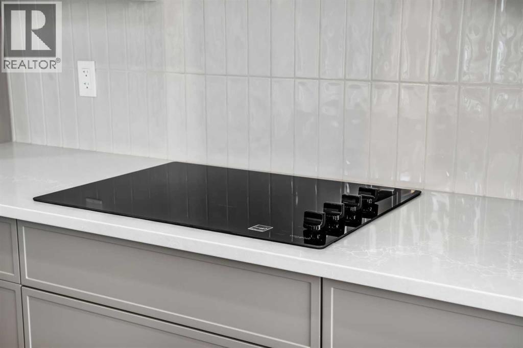 151 Dawson Wharf Mount, Chestermere, Alberta  T1X 2W4 - Photo 14 - A2292338