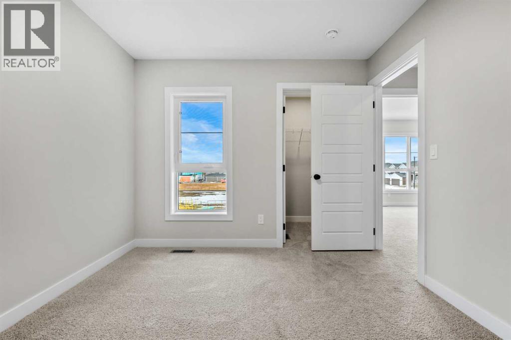 151 Dawson Wharf Mount, Chestermere, Alberta  T1X 2W4 - Photo 44 - A2292338