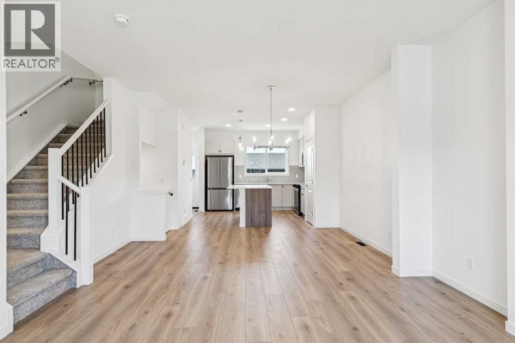 15 Emberside Park, Cochrane, Alberta  T4C 3H8 - Photo 4 - A2292948