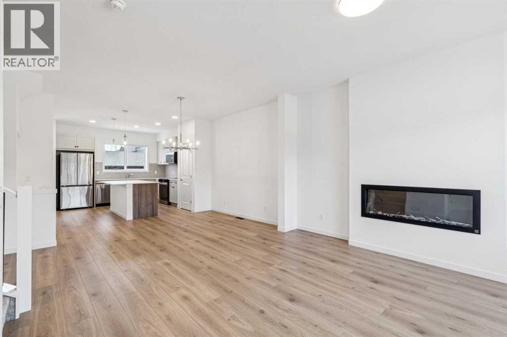 15 Emberside Park, Cochrane, Alberta  T4C 3H8 - Photo 3 - A2292948