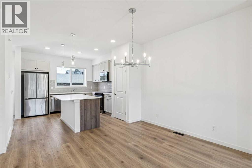 15 Emberside Park, Cochrane, Alberta  T4C 3H8 - Photo 8 - A2292948