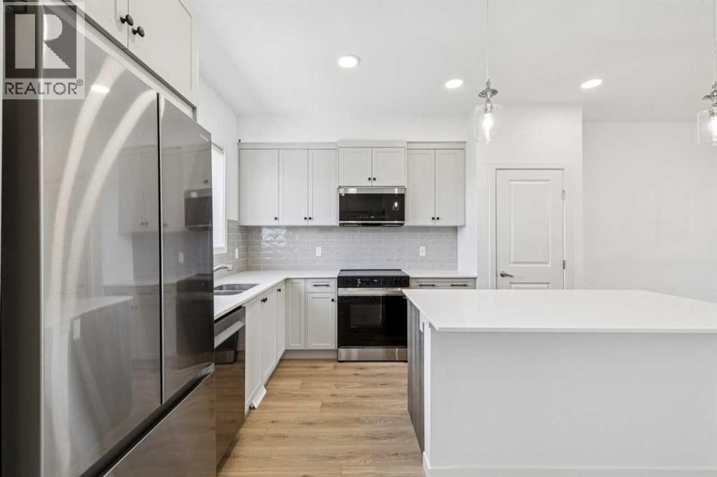 15 Emberside Park, Cochrane, Alberta  T4C 3H8 - Photo 10 - A2292948