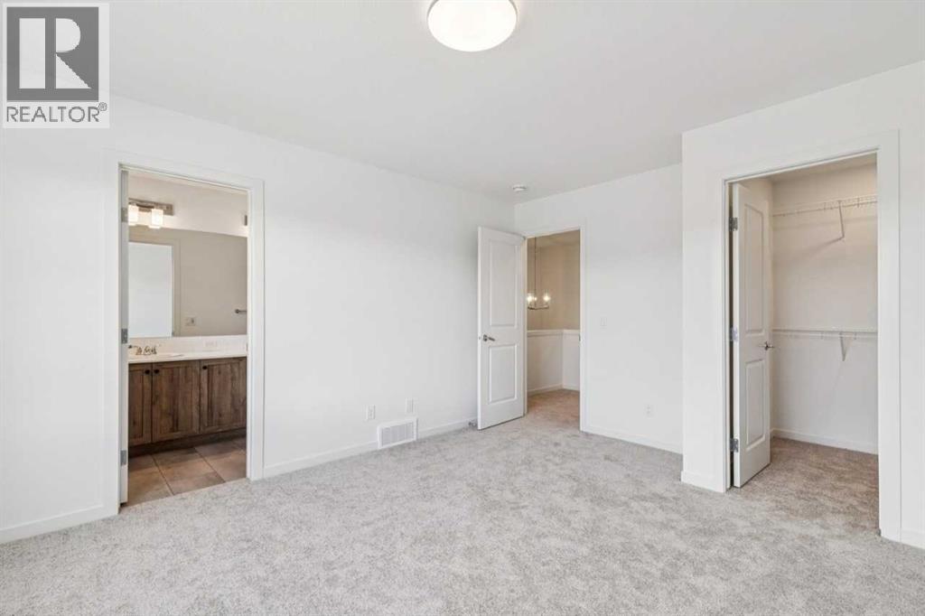 15 Emberside Park, Cochrane, Alberta  T4C 3H8 - Photo 15 - A2292948