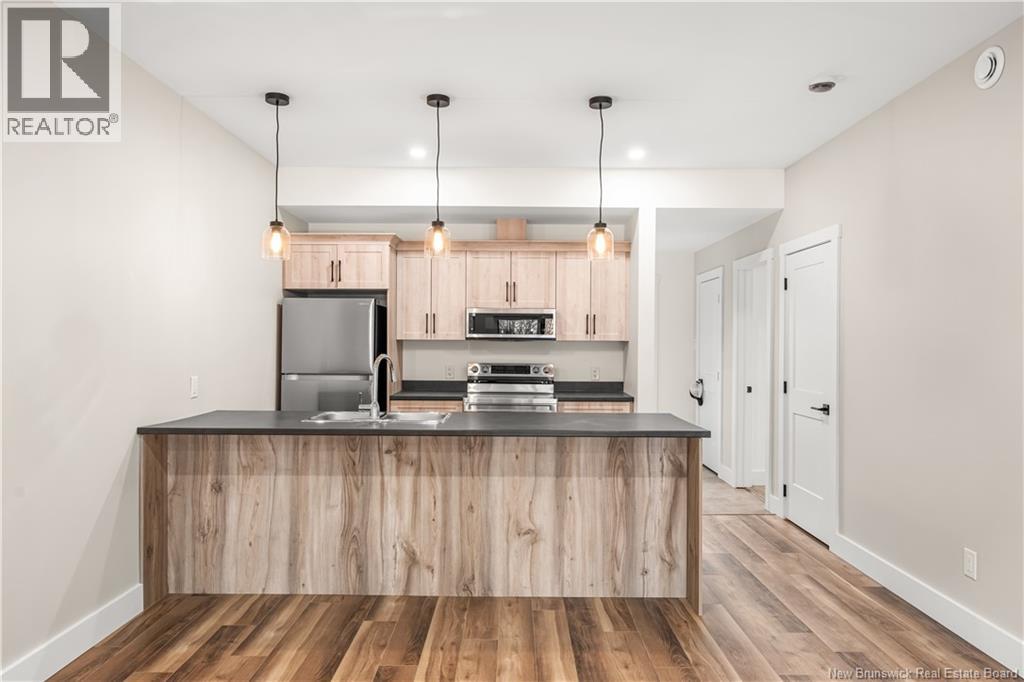 1300 Golden Park Circle Unit# 4, Bathurst, New Brunswick  E2A 1V1 - Photo 12 - NB138017