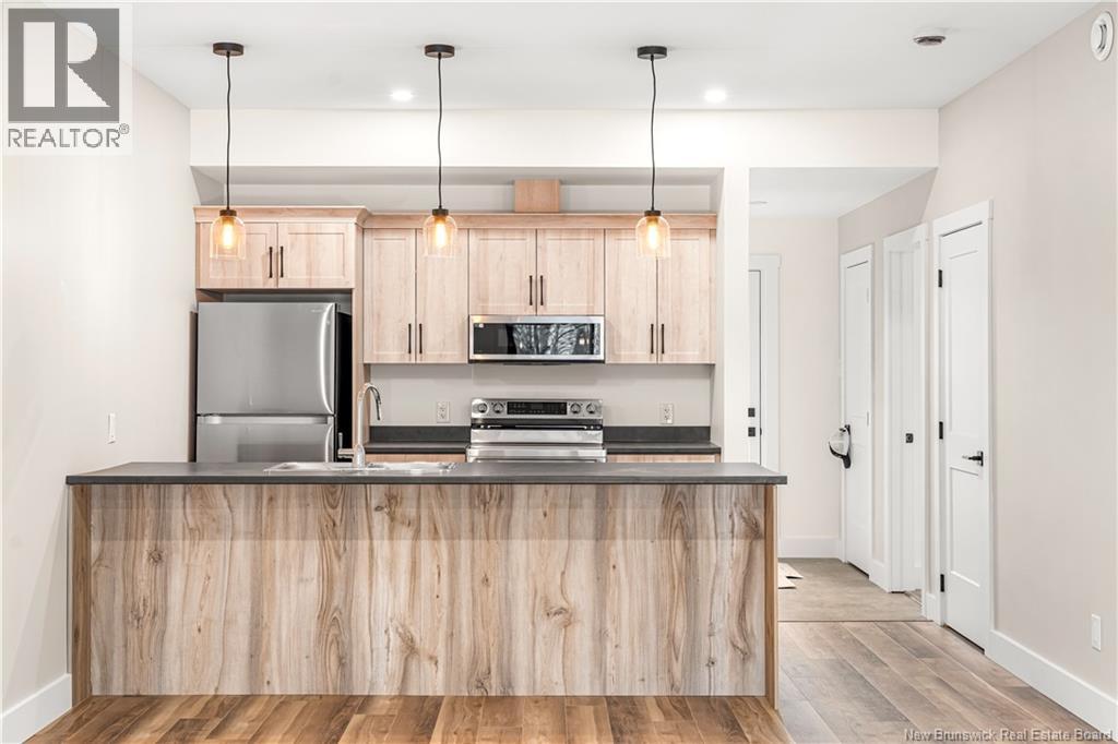 1300 Golden Park Circle Unit# 4, Bathurst, New Brunswick  E2A 1V1 - Photo 14 - NB138017