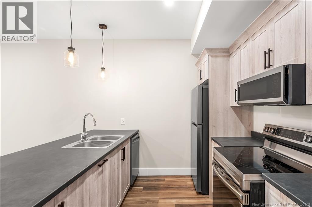 1300 Golden Park Circle Unit# 4, Bathurst, New Brunswick  E2A 1V1 - Photo 18 - NB138017