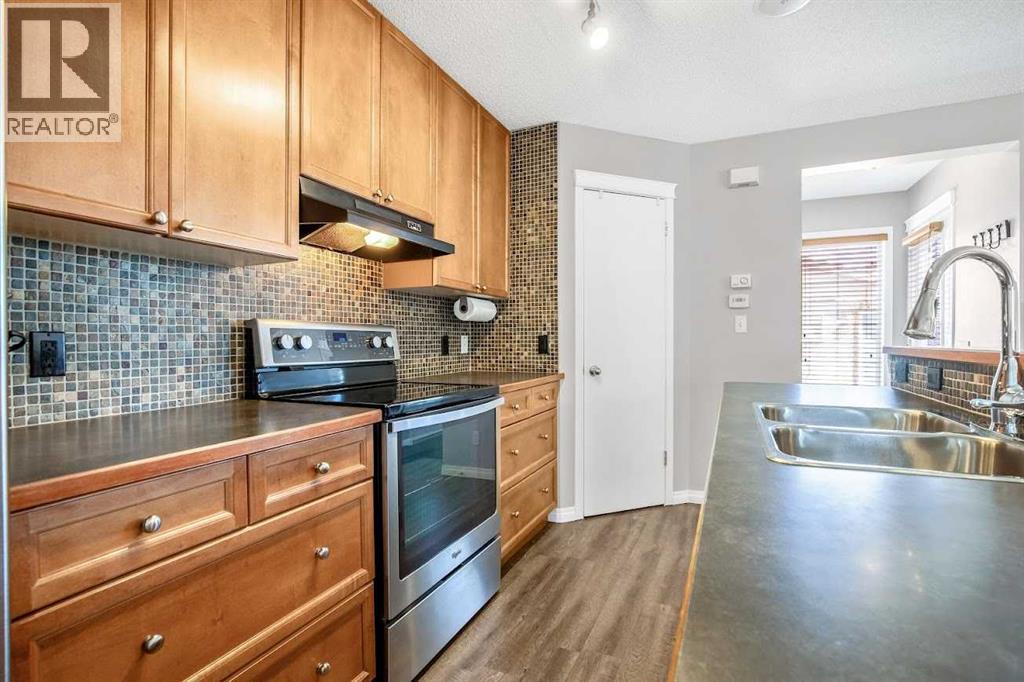 106 Tuscany Springs Heights Nw, Calgary, Alberta  T3L 2X9 - Photo 9 - A2304878